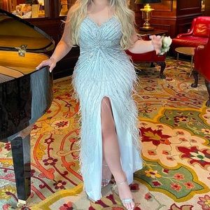 gorgeous gala dress only worn once to prom, in excellent near new condition.